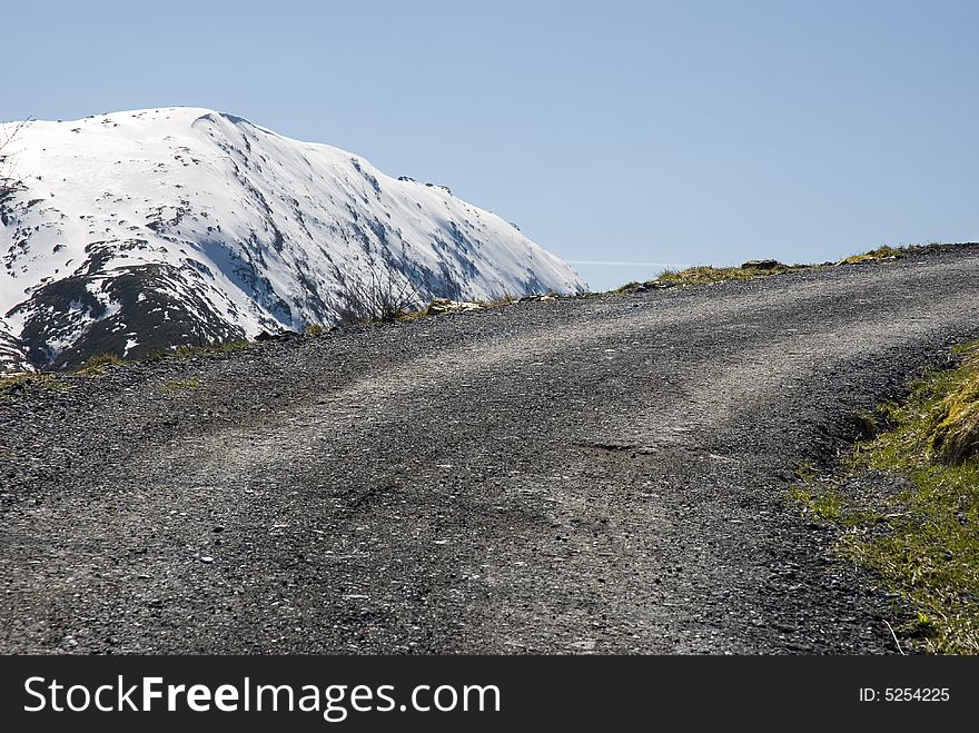 Road curving around a mountain side !. Road curving around a mountain side !