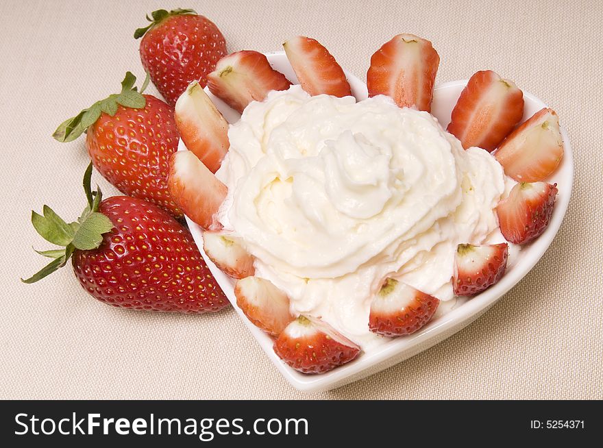 Dessert from a strawberry with a cream. Dessert from a strawberry with a cream.