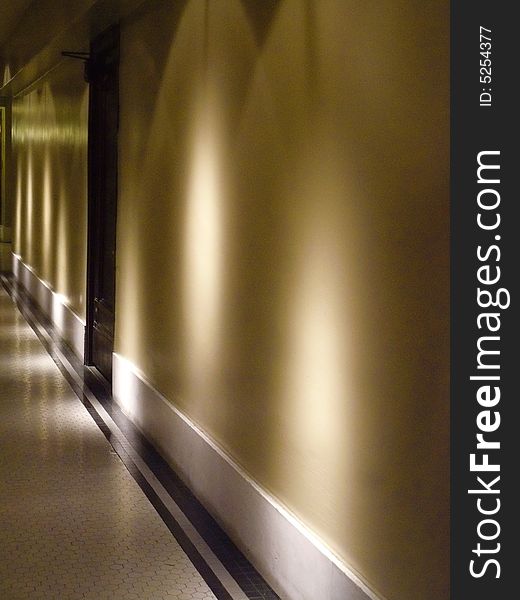 A dramatically lit, quiet hallway upstairs in Kansas City's Union Station, which is on the National Register of Historic Places