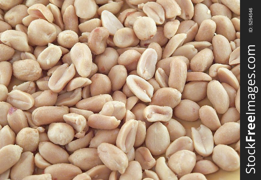 Close up of the salted peanuts. Background.
