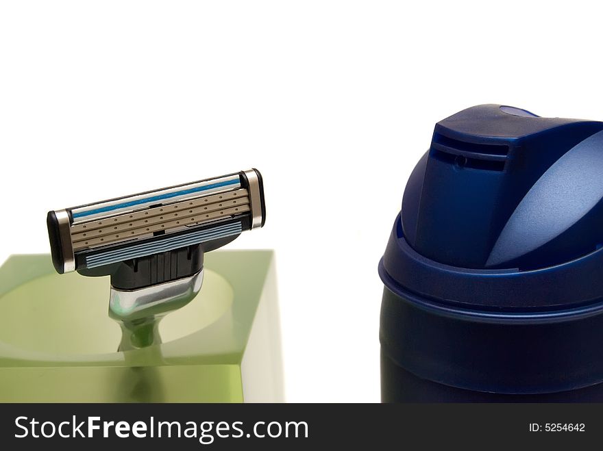 Razor And Dispenser On A White Background