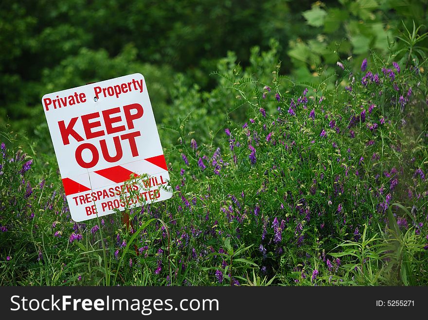 No Trespassing Sign in field