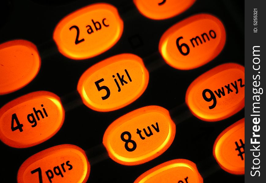 Illuminated phone keypad on an office phone. Illuminated phone keypad on an office phone