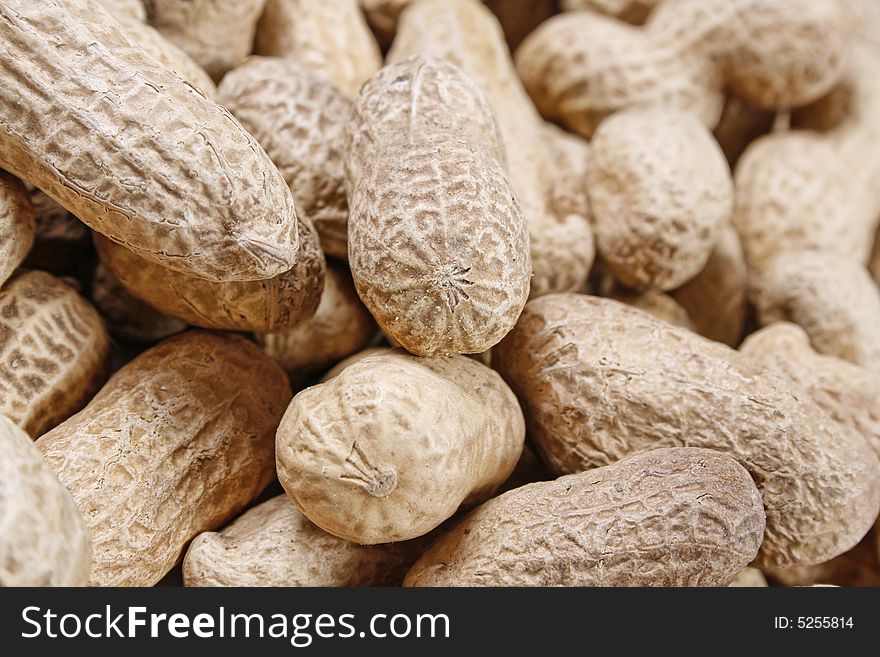 Tasty peanut close up background. Tasty peanut close up background