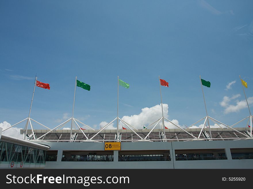 Flags on airport terminal building