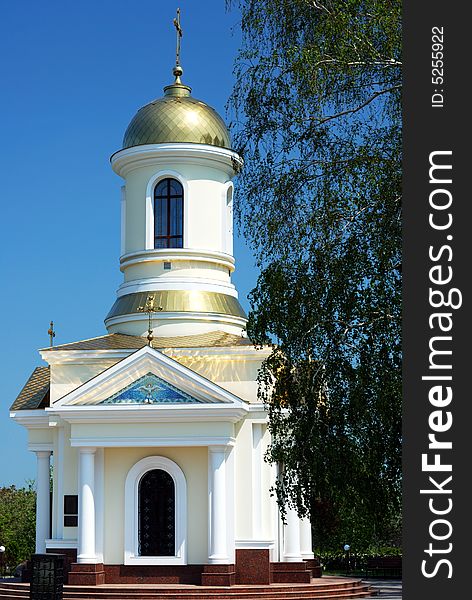 Small church over clear blue sky