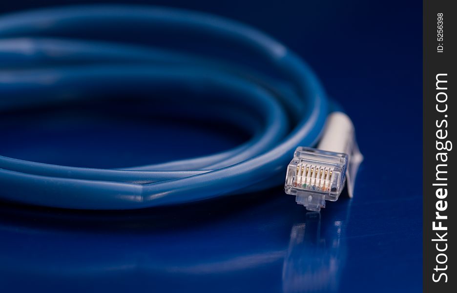 Network Cable isolated on a blue background