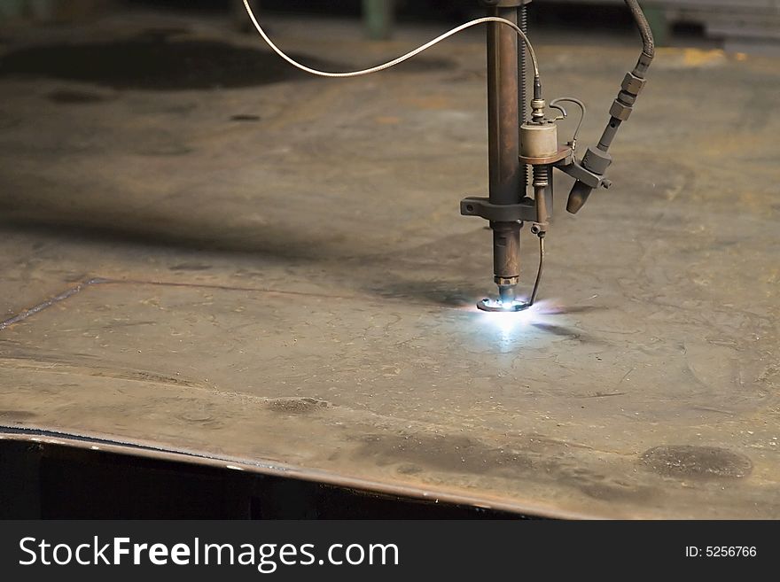Flame cutting of a steel plate. Flame cutting of a steel plate