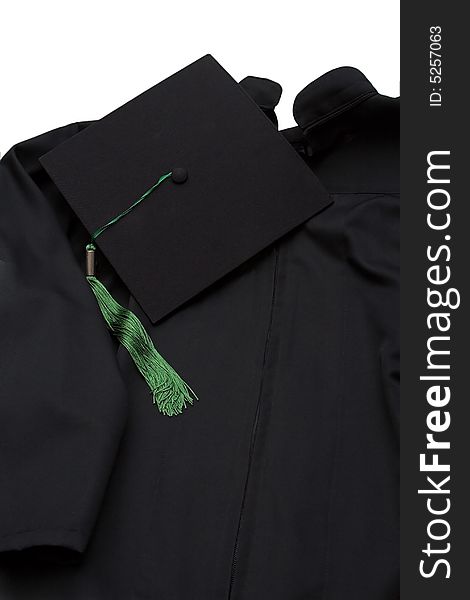 Graduation robe and cap on white background