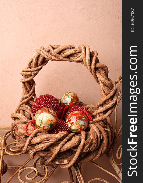 Woven Christmas basket on an old rustic bench. Woven Christmas basket on an old rustic bench