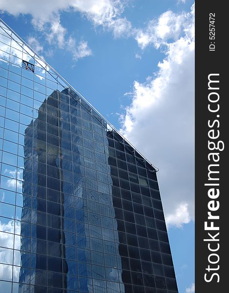Modern building and sky with clouds. Modern building and sky with clouds.