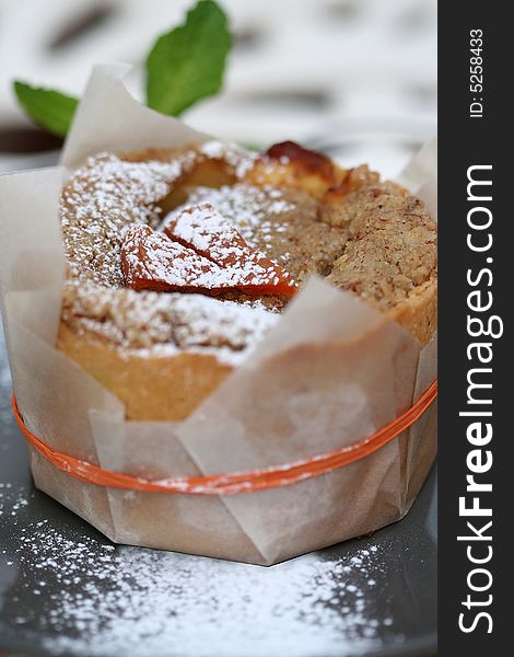 Iced apricot tart presented with mint
