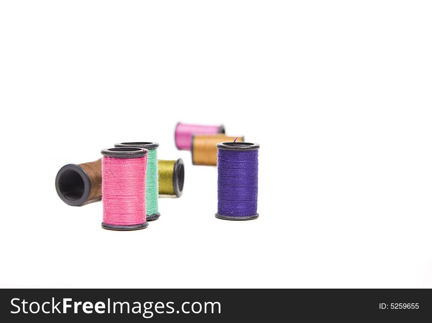 Spools of thread isolated on white