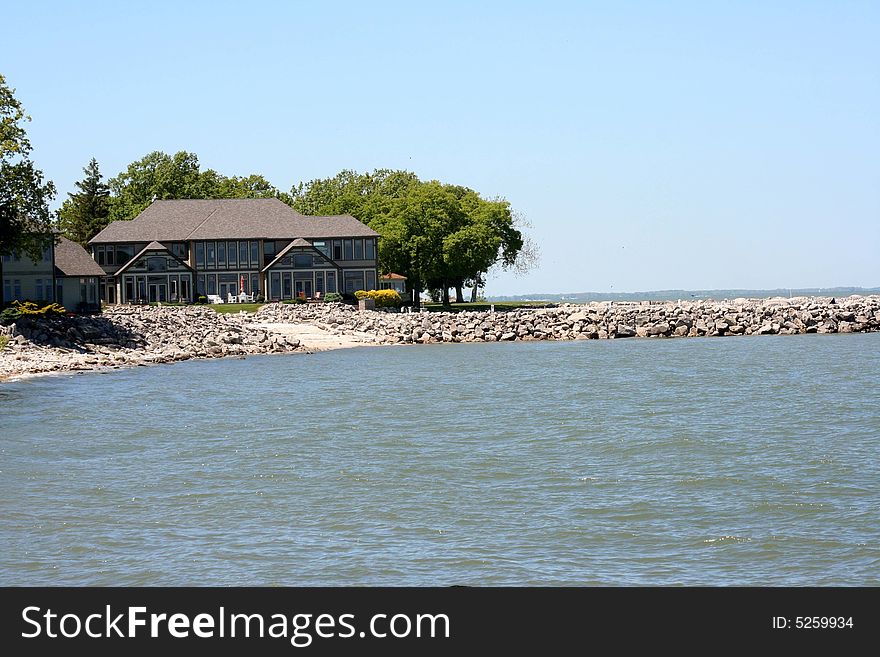 Image of a beautiful house on the lake. Image of a beautiful house on the lake