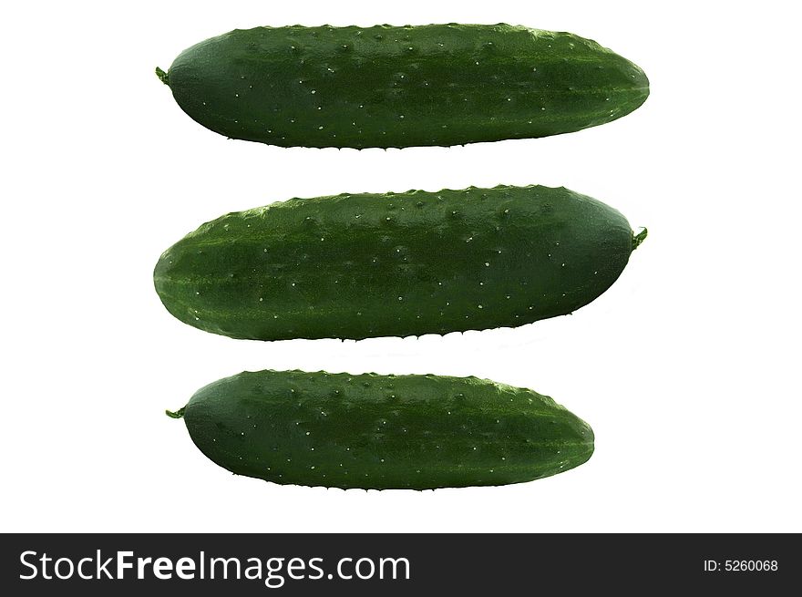 Three fresh cucumbers. Isolated on the white. Three fresh cucumbers. Isolated on the white.