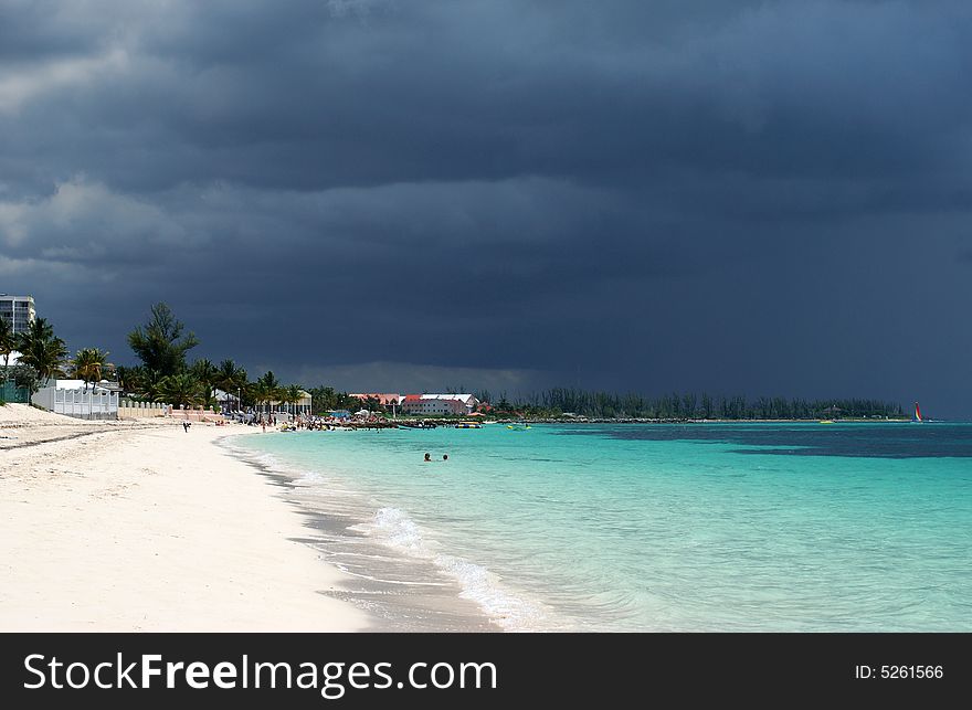 Dark stormy clouds over Our Lucaya beach on Grand Bahama Island, The Bahamas. Dark stormy clouds over Our Lucaya beach on Grand Bahama Island, The Bahamas.