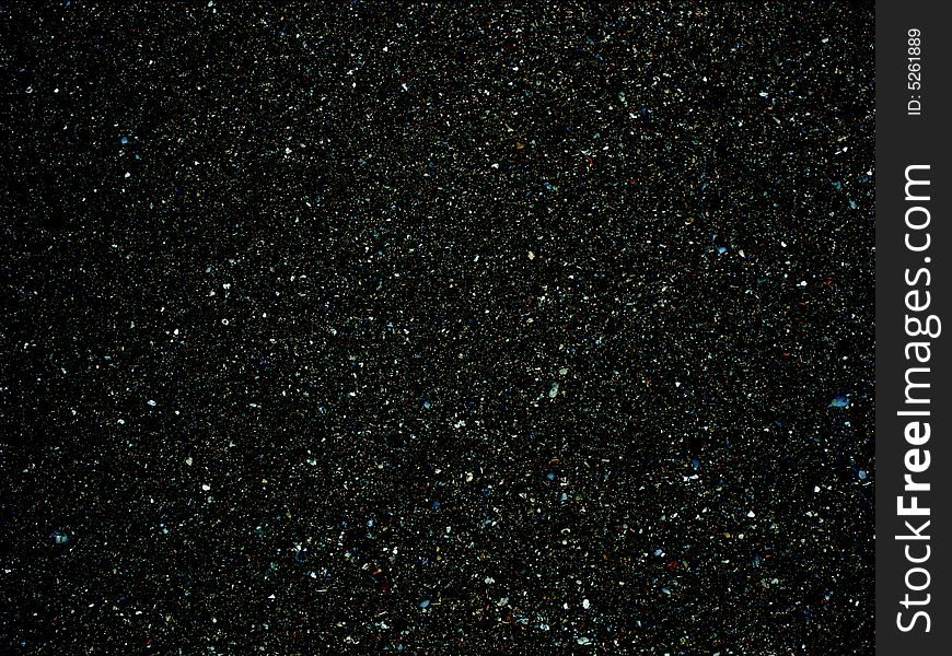 A fine sand grain which is totally black in colour. A fine sand grain which is totally black in colour