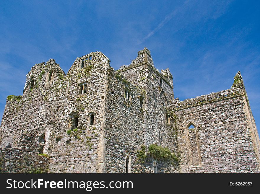 Ruins of an old abbey against a striking blue sky. Ruins of an old abbey against a striking blue sky