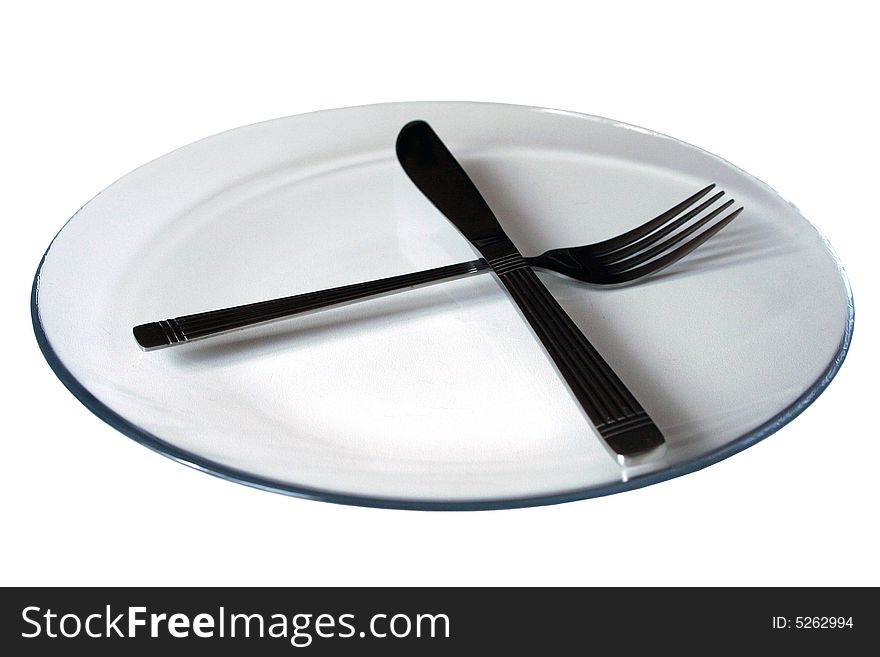 Plate with knife and fork on white background. Plate with knife and fork on white background