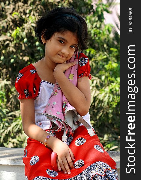 A girl with her umbrella in a nice mischievous mood.