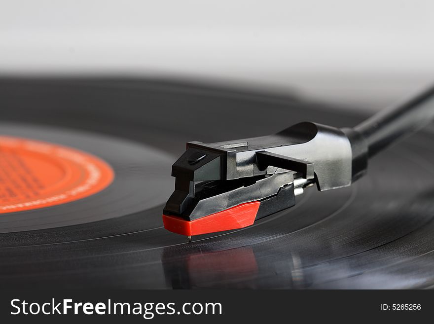 Close up of a record players needle.