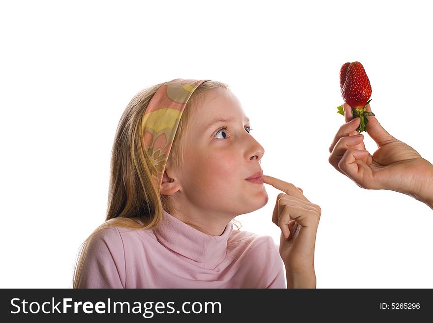 Young girl and hand with strawberry. Young girl and hand with strawberry