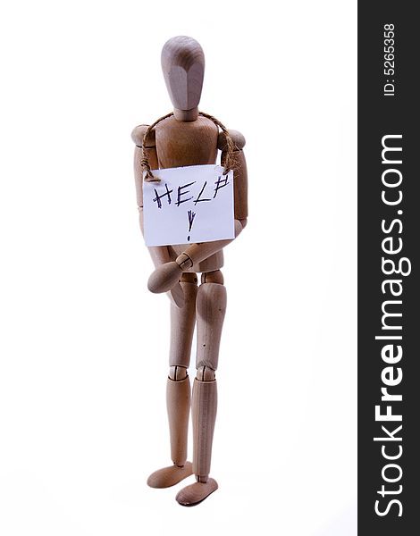 A wooden art mannequin with a help sign around its neck. A wooden art mannequin with a help sign around its neck.