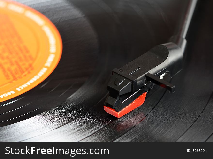 Close up of a record players needle.