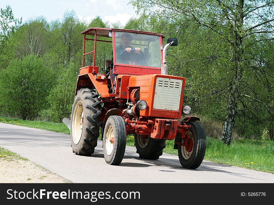 Poland Farmer In Tractor