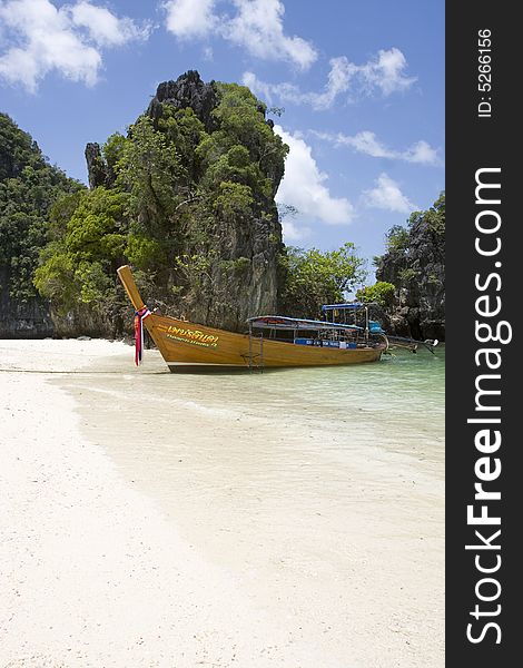 Longtail boat on deserted beach, Hong Island, Southern Thailand