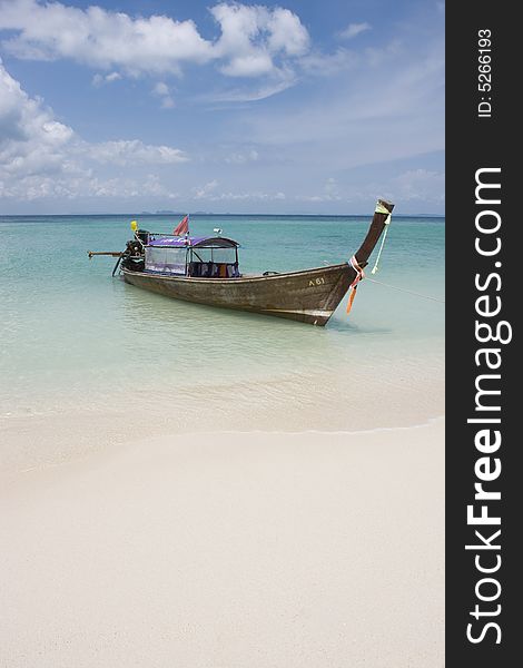 Longtail boat on deserted beach, Poda Island, Southern Thailand