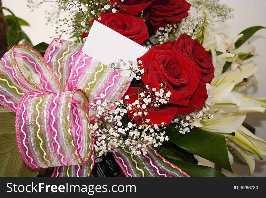 Lovely flower bouquet with ribbon and card. Lovely flower bouquet with ribbon and card
