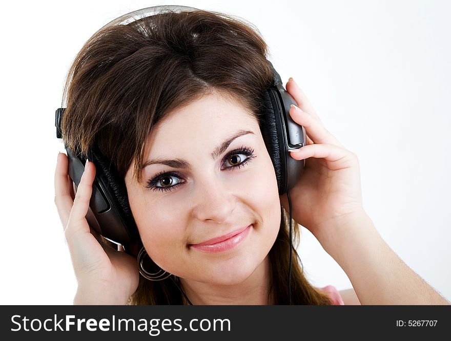 An image of woman in headphone. An image of woman in headphone