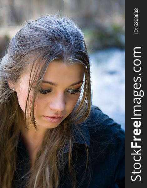 Portrait of young girl on forest background