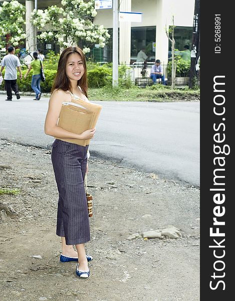 Woman With Envelopes Going To Post OFfice