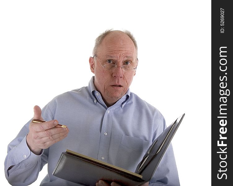 An older guy in a blue shirt explaining an estimate or problem. An older guy in a blue shirt explaining an estimate or problem