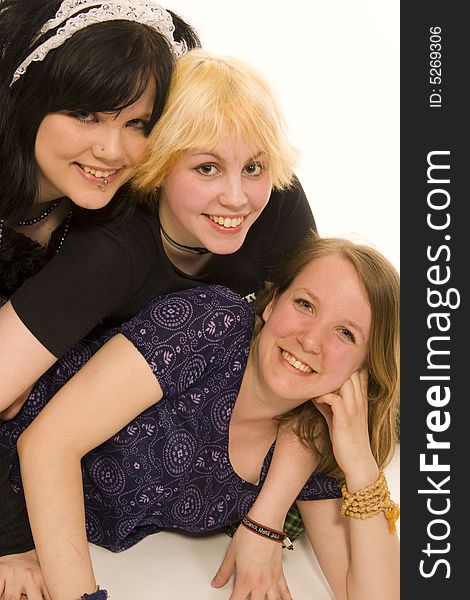 Three young girls on white background. Three young girls on white background