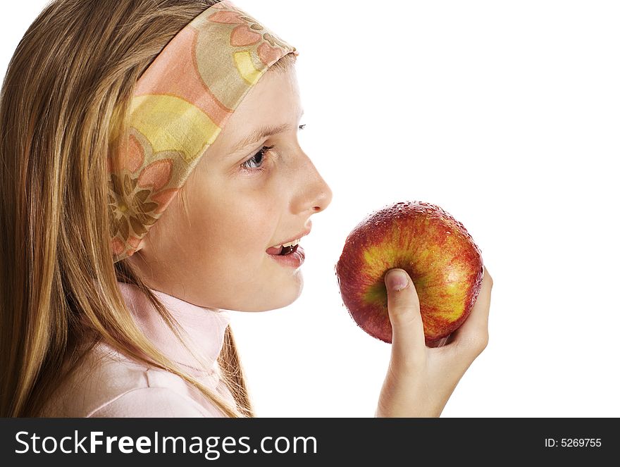 Teenager with apple on the white background
