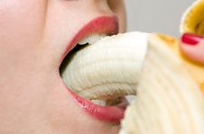 Girl Eating Banana Closeup Stock Photos
