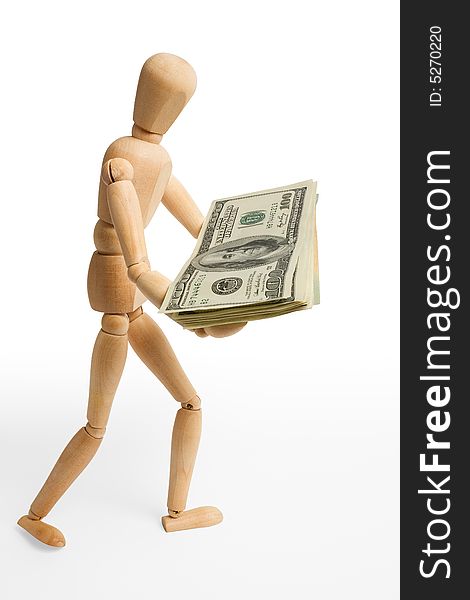 The wooden figure holds dollars.Isolated on white [with clipping path]. The wooden figure holds dollars.Isolated on white [with clipping path].