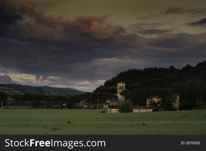 Isolated abbey in te middel of the umbrian countryside at sunset, Italy. Isolated abbey in te middel of the umbrian countryside at sunset, Italy