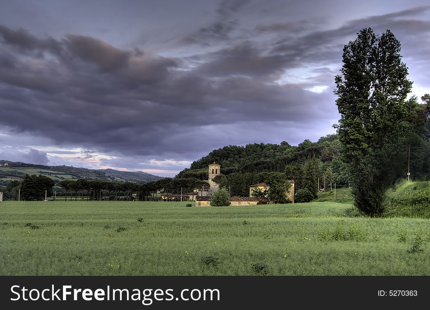 Isolated abbey in te middel of the umbrian countryside at sunset, Italy. Isolated abbey in te middel of the umbrian countryside at sunset, Italy