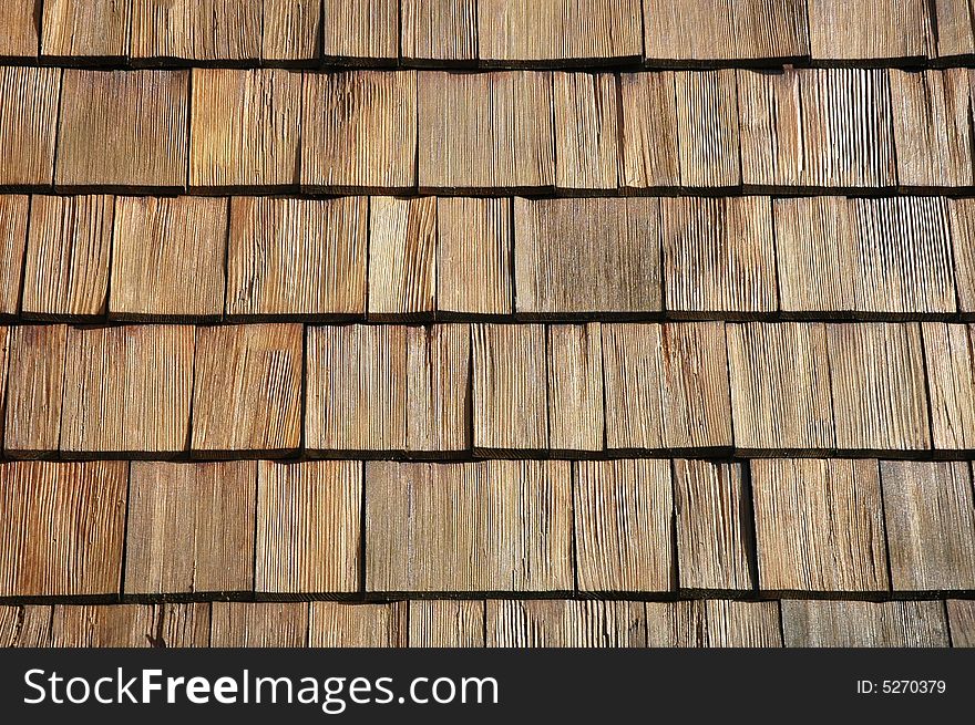 Wooden tiling on a house wall