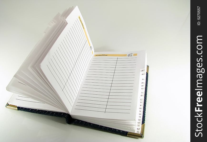 The opened notebook on a white background