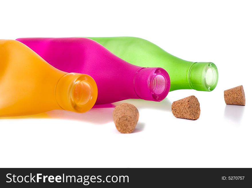 Colorful bottles on a white background with copy space. Colorful bottles on a white background with copy space