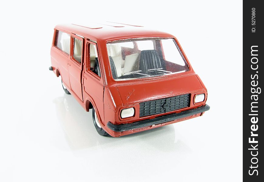 Model of the red car on a white background. Model of the red car on a white background