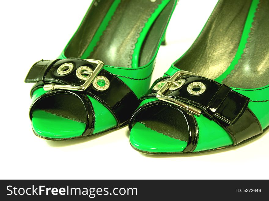 Green High-heeled shoes close-up. Series