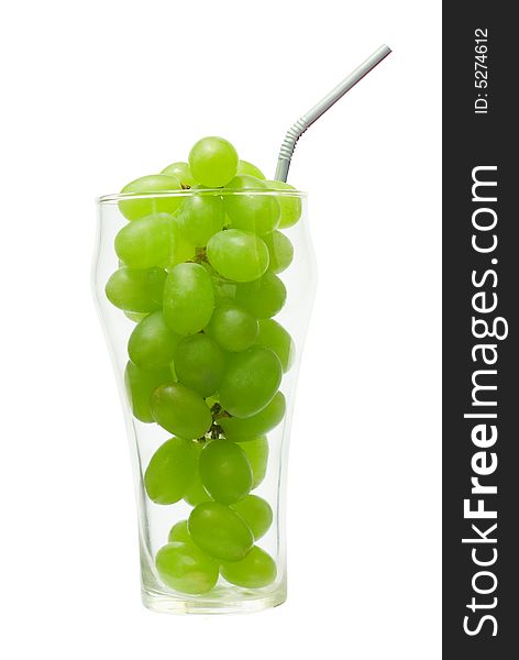 Grape in the glass with straw isolated on white