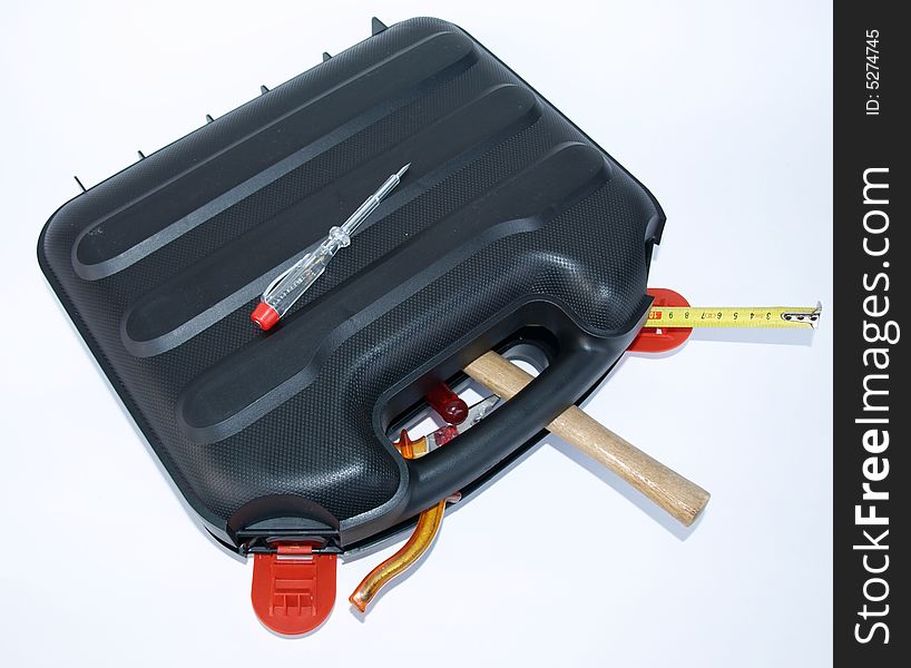 The suitcase with several tools.