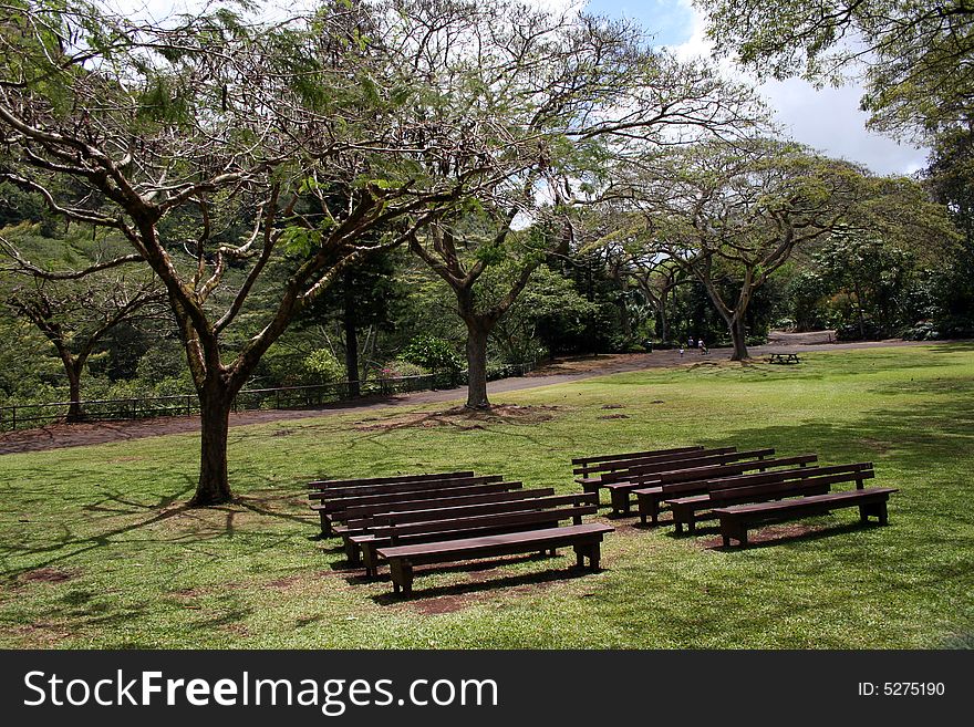 Seating for a small outdoor theater can be seen from the stage.